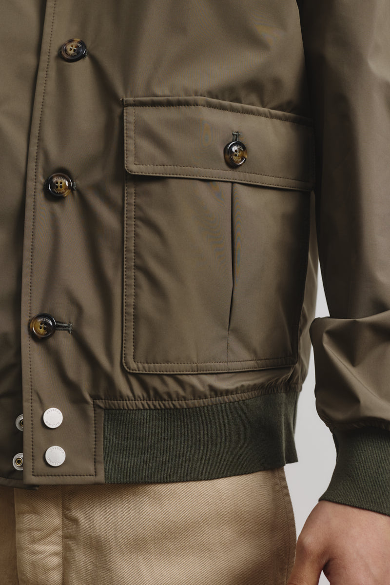 Packable Vasltarino in 3 layer microfiber, waterproof. Green - Caper