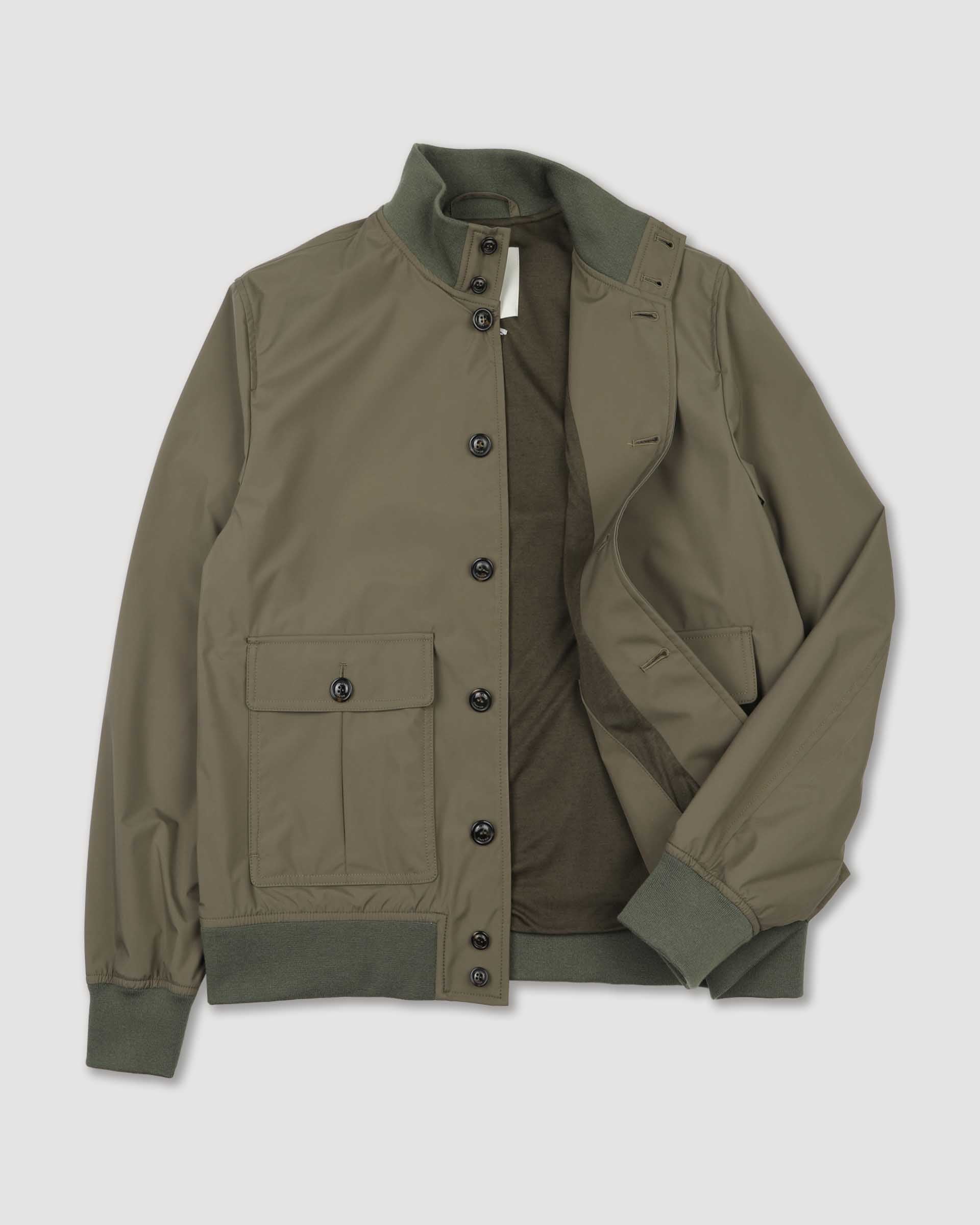 Packable Valstarino jacket in water-proof technical microfiber fabric.