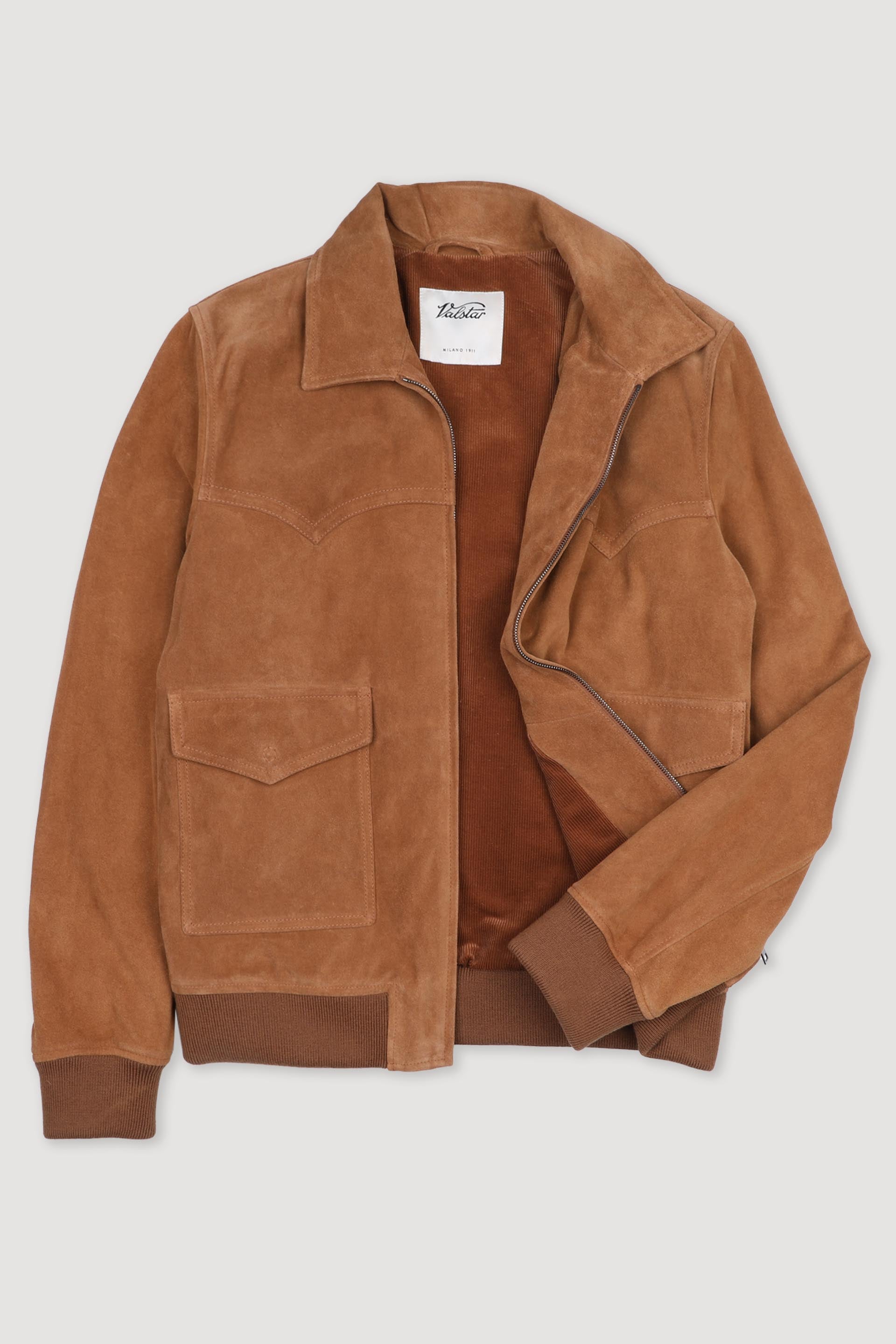 Lined jacket in rough suede with Western-style details. Brown - Miele