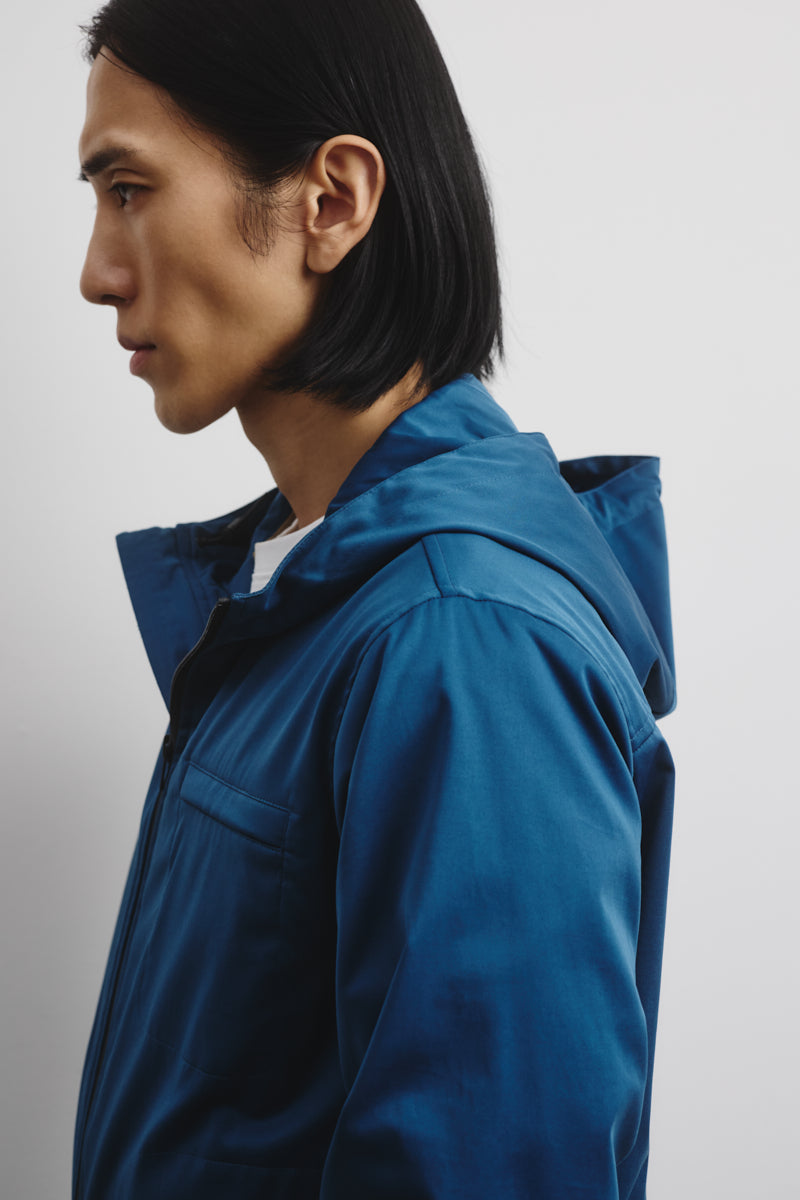 Hooded zip jacket in 2 layer bonded techno fabric. Lined. Blue - Ottan