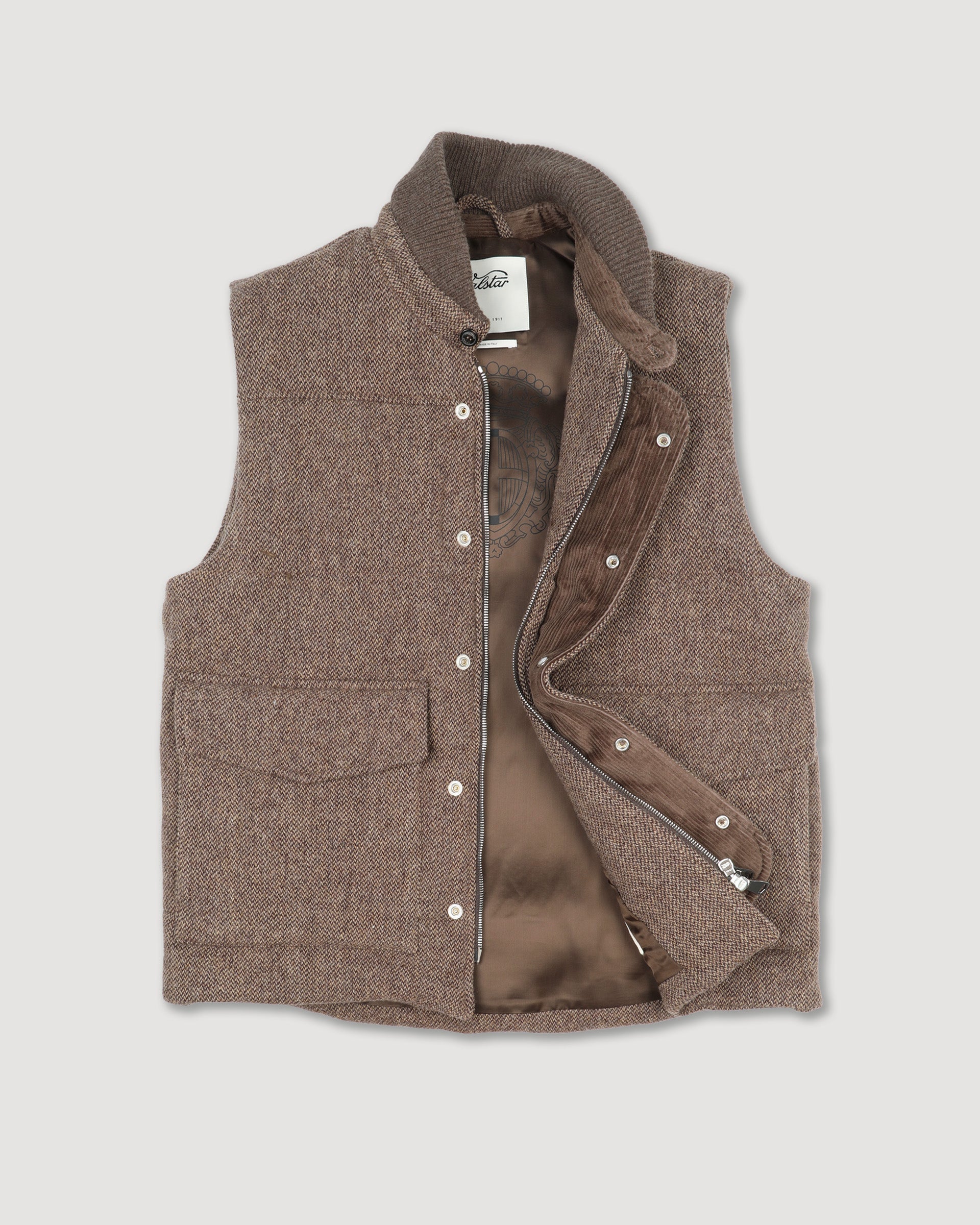 Locke padded vest in broken twill wool fabric with knitted collar. Bro