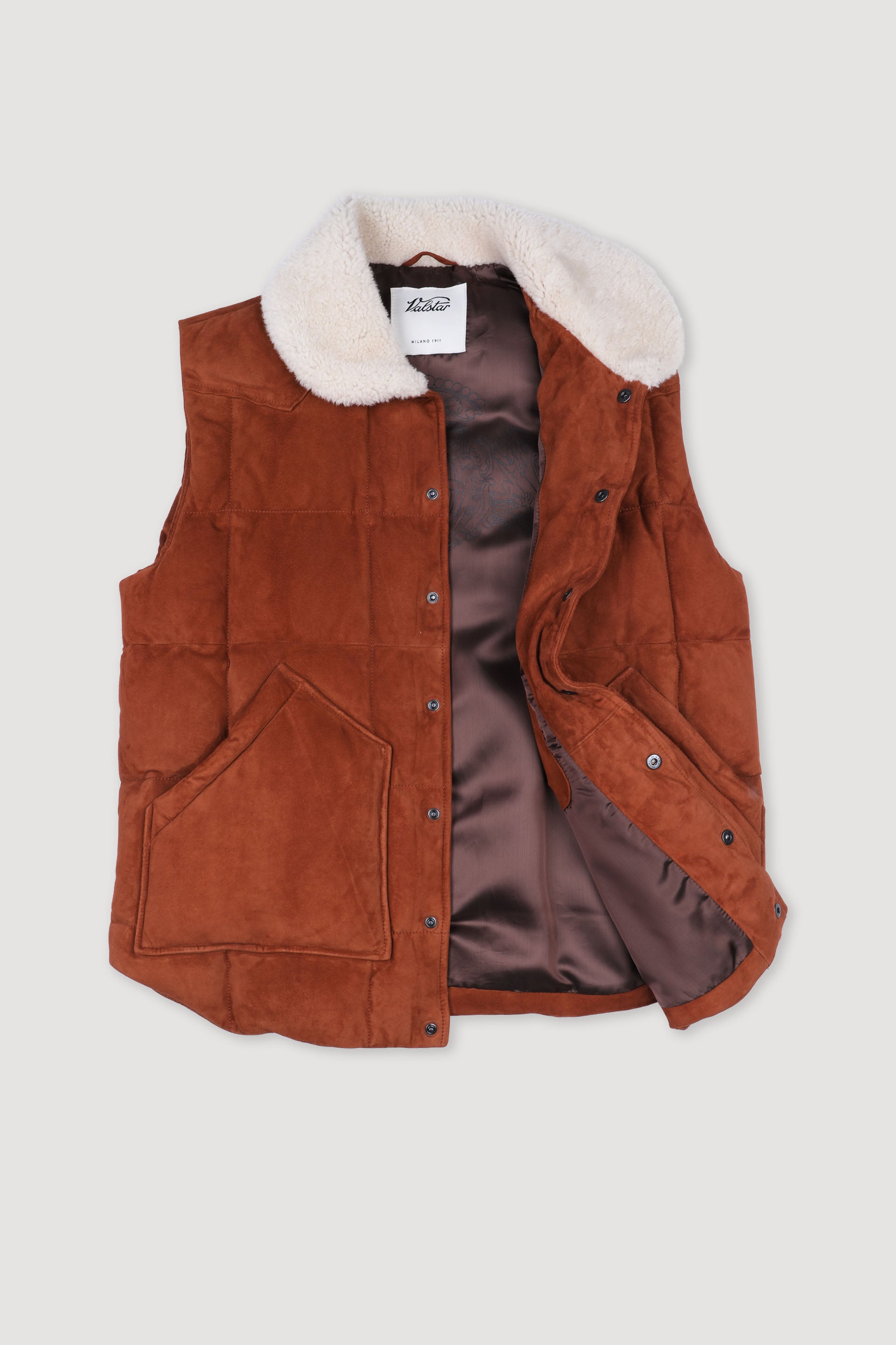 Yosemite down padded vest in suede leather whit shearling collar. Brow